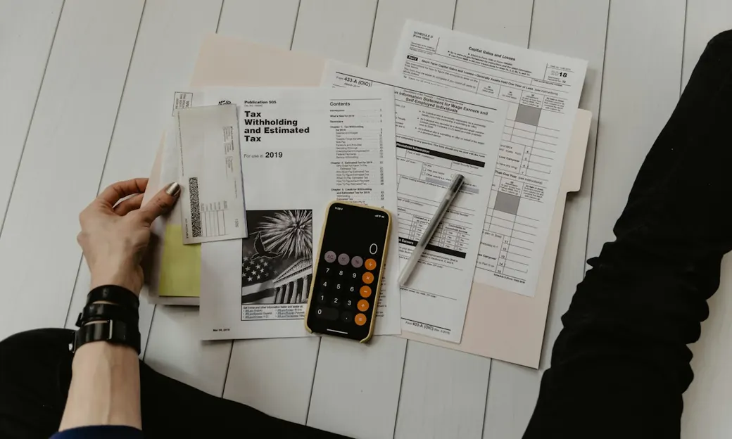 Calculator and notebook for budgeting