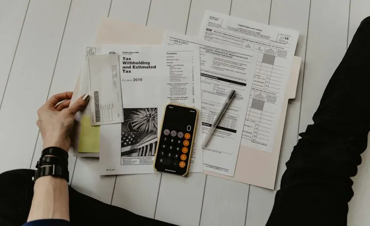 Calculator and notebook for budgeting